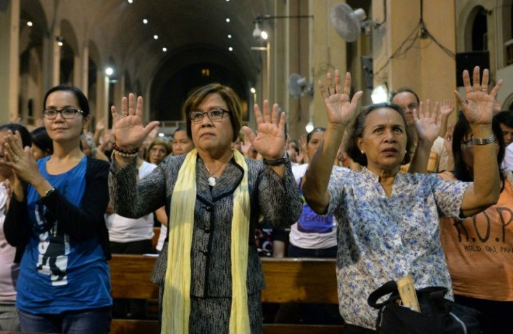 Philippine Senator Leila de Lima offering prayers during a 2016 mass offered for victims of extra-judicial killings, she said she has no regrets in seeking to shine a light on Duterte's administration