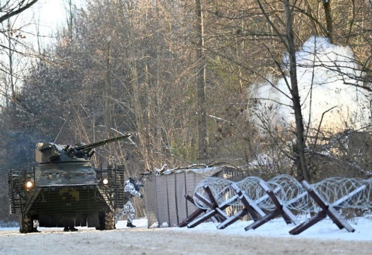 Russia has amassed some 100,000 troops near its border of ex-Soviet Ukraine