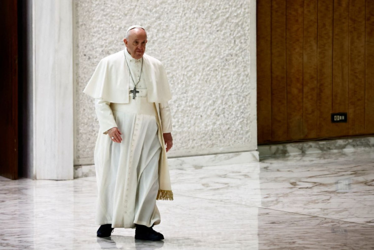 Pope Francis arrives for the weekly general audience at the Paul VI Audience Hall at the Vatican, February 9, 2022. 
