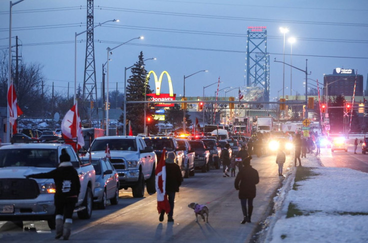 Vehicles block the route leading from the Ambassador Bridge, linking Detroit and Windsor, as truckers and their supporters continue to protest against the coronavirus disease (COVID-19) vaccine mandates, in Windsor, Ontario, Canada February 8, 2022.
