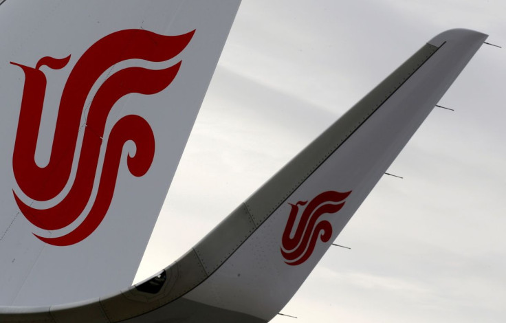 The logo of Air China is pictured on a tail of an airplane parked at the aircraft builder's headquarters of Airbus in Colomiers near Toulouse, France, November 15, 2019. 