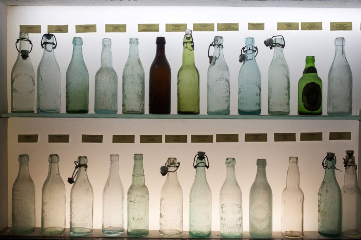 Vintage beer bottles, some dating back to the 1800's are displayed in a showcase at the Brooklyn Brewery in the Brooklyn borough of New York, United States, March 9, 2015.