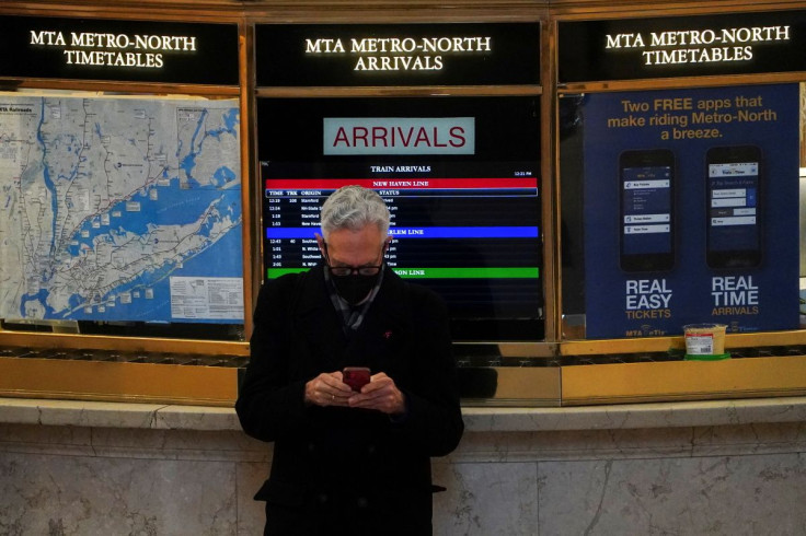 A person wearing a mask stands at Grand Central Terminal during the coronavirus disease (COVID-19) pandemic, in the Manhattan borough of New York City, New York, U.S., February 9, 2022.  