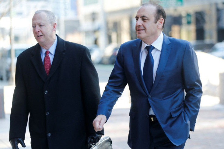 Former Wynn Resorts executive Gamal Abdelaziz, also known as Gamal Aziz, arrives at the federal courthouse before being sentenced in connection with a nationwide college admissions cheating scheme, in Boston, Massachusetts, U.S., February 9, 2022.