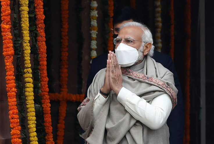 India's Prime Minister Narendra Modi gestures as he arrives inside the parliament premises on the first day of the budget session in New Delhi, India, January 31, 2022.