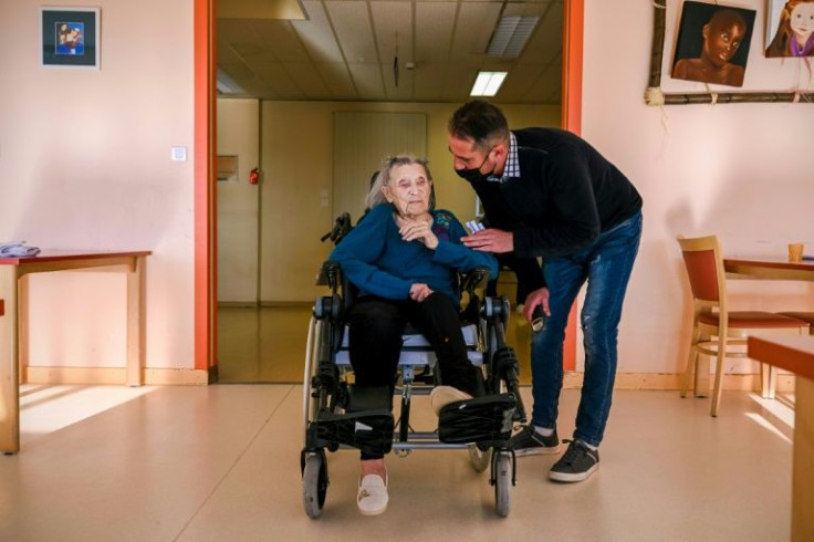 Saubion has no specific illness, but her body has gone immobile, and she is almost deaf, picking up only the occasional word