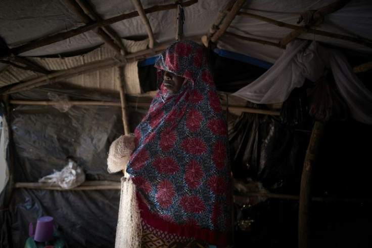 'Rokia' says all the men in her family were kidnapped by jihadists as they headed up the Niger River for fishing. The lone male is a boy, Amadou, who was born two days after the abduction