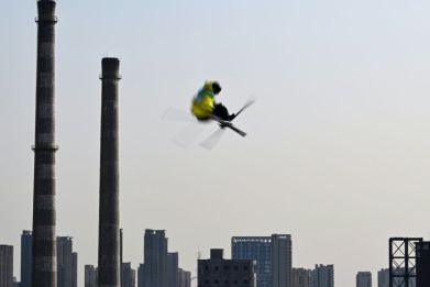 The 60-metre-high "Big Air" jumping platform was built on the grounds of aÂ century-old decommissioned steel mill