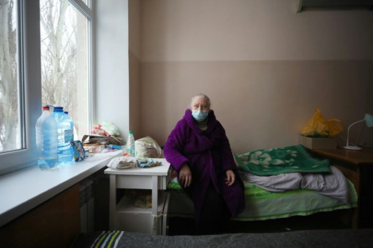 73-year-old patient Lyudmila Isaychenko insists she will not be cowed into hiding in the basement