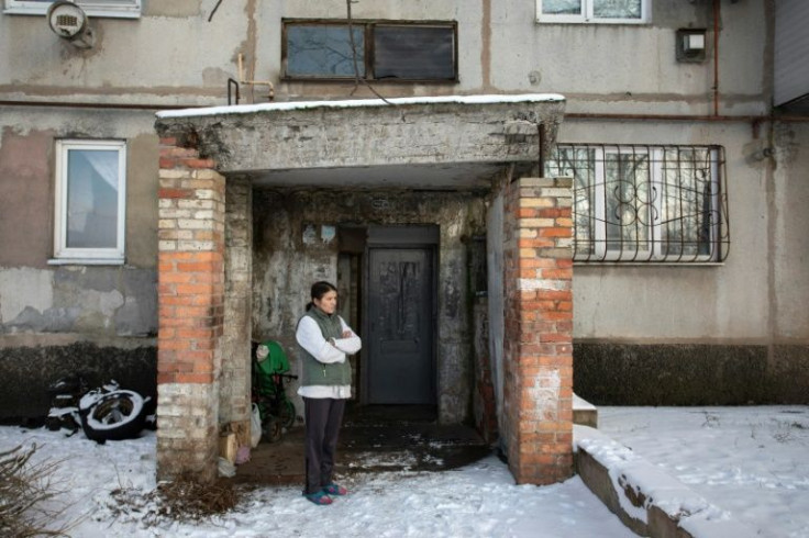 The eastern Ukrainian town of Krasnogorivka has been left impoverished by a simmering conflict that has claimed more than 14,000 lives