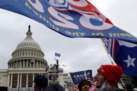 Pro-Trump protester clash with Capitol police during a rally to contest the certification of the 2020 U.S. presidential election results by the U.S. Congress, at the U.S. Capitol Building in Washington, U.S, January 6, 2021. 
