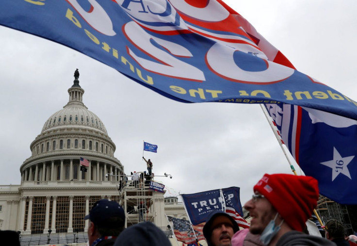 Pro-Trump protester clash with Capitol police during a rally to contest the certification of the 2020 U.S. presidential election results by the U.S. Congress, at the U.S. Capitol Building in Washington, U.S, January 6, 2021. 