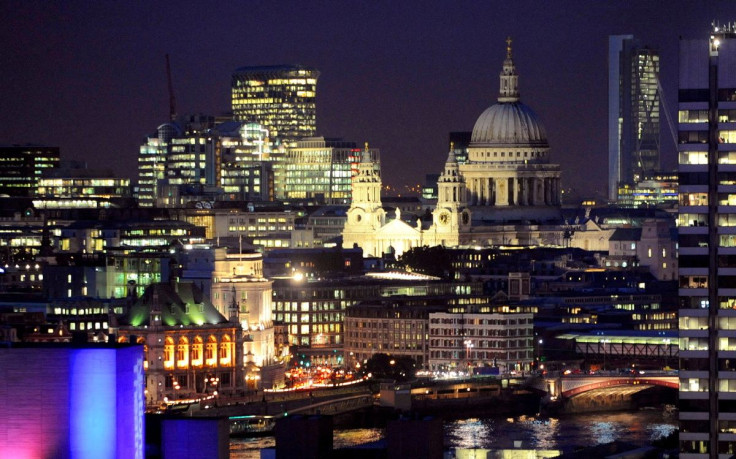 St Paul's Cathedral and areas of the financial district of the City of London are seen at dusk October 9, 2008.