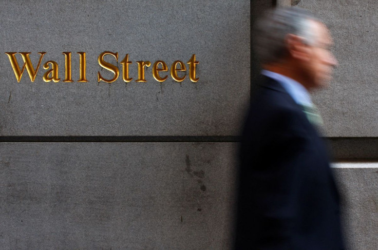 A man walks along Wall Street in New York September 18, 2008. 