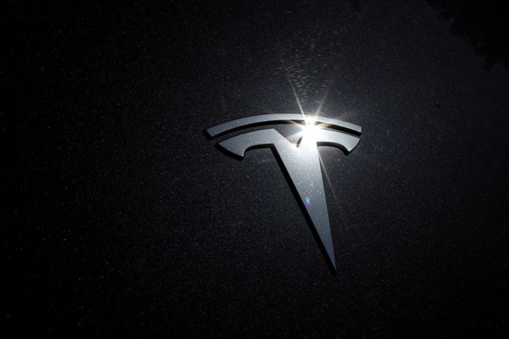 The Tesla logo is seen on a car in Los Angeles, California, U.S., July 9, 2020.  