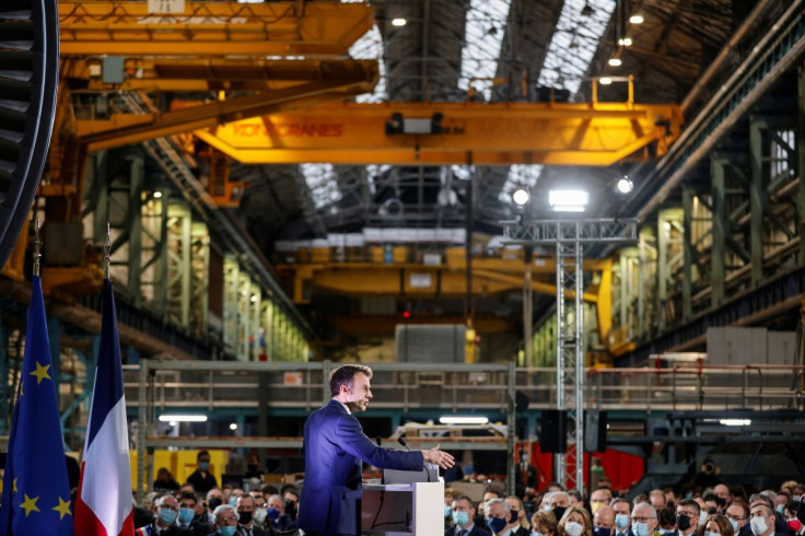 French President Emmanuel Macron delivers a speech at the main production site of GE Steam Power System, where he unveiled plans to build new nuclear reactors in the country as part of its energy strategy to reduce planet-warming emissions, in Belfort, Fr