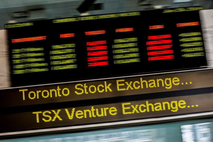 A sign board displaying Toronto Stock Exchange (TSX) stock information is seen in Toronto June 23, 2014.  