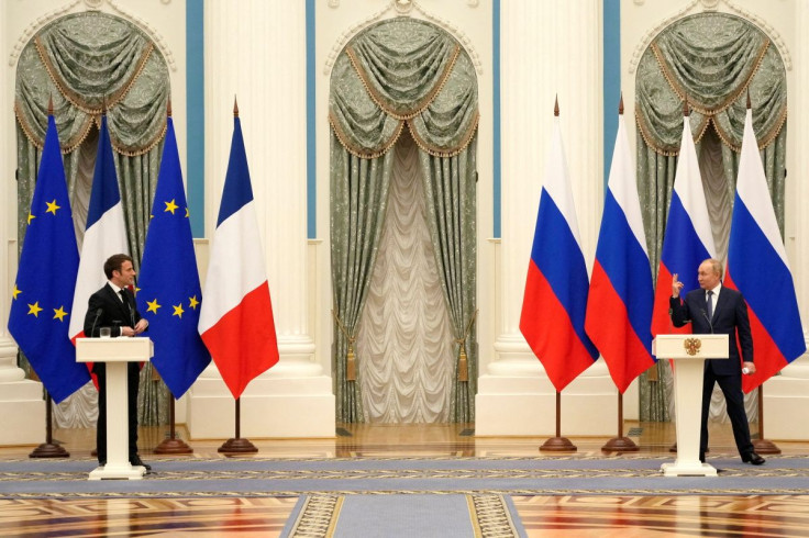 Russian President Vladimir Putin and French President Emmanuel Macron, attend a joint press conference, in Moscow, Russia, February 7, 2022. Thibault Camus/Pool via