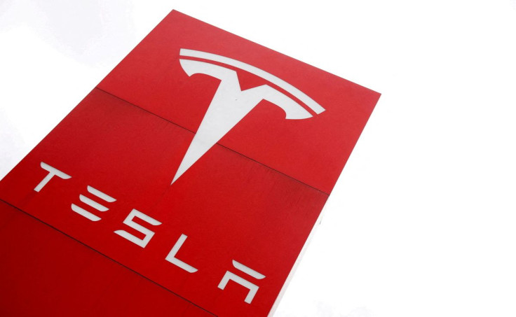 The logo of car manufacturer Tesla is seen at a dealership in London, Britain, May 14, 2021. 