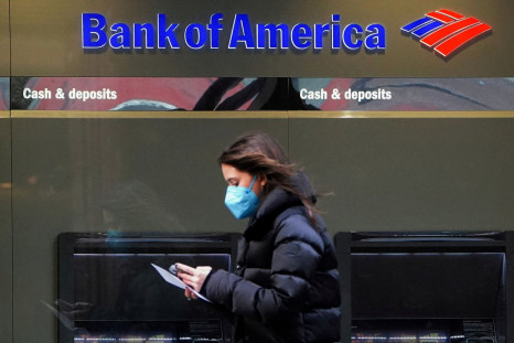 A person walks past a Bank of America sign in the Manhattan borough of New York City, New York, U.S., January 19, 2022. 