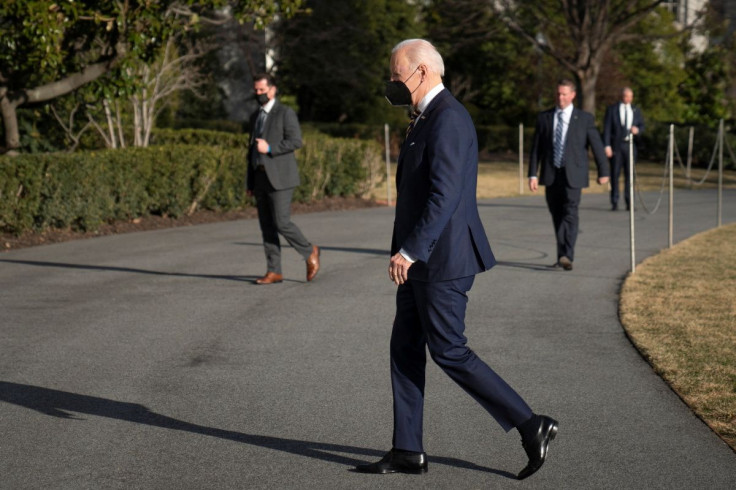 U.S. President Joe Biden walks through South Lawn from Marine One to the White House following a trip to Virginia, in Washington, U.S., February 10, 2022.