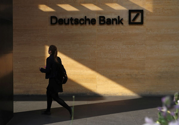 A woman walks past a Deutsche Bank office in London, Britain July 8, 2019.
