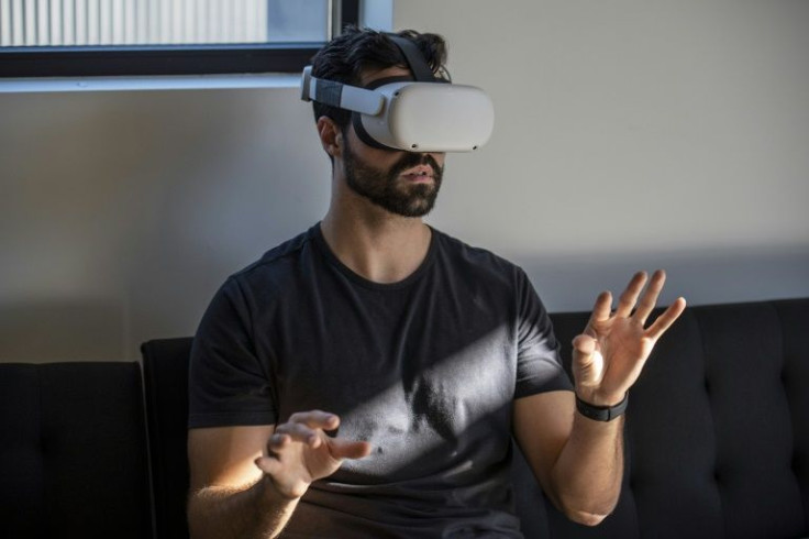 Gavin Menichini, using the Oculus Quest 2 VR headset, gives a demonstration of the Immersed Virtual Reality program which can be used for many applications including virtual meetings at the Immersed offices on January 28, 2022 in Austin, Texas