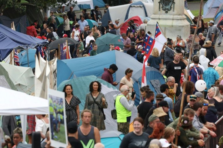 Protester numbers outside New Zealand's parliament have swelled after police scaled back efforts to clear anti-vaccine demonstrators