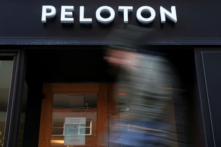 FILE PHOTO - A person walks past a Peloton store in the Manhattan borough of New York City, U.S., January 25, 2022.  