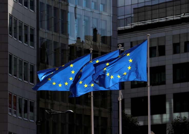 European Union flags flutter outside the European Commission headquarters in Brussels, Belgium August 21, 2020. 