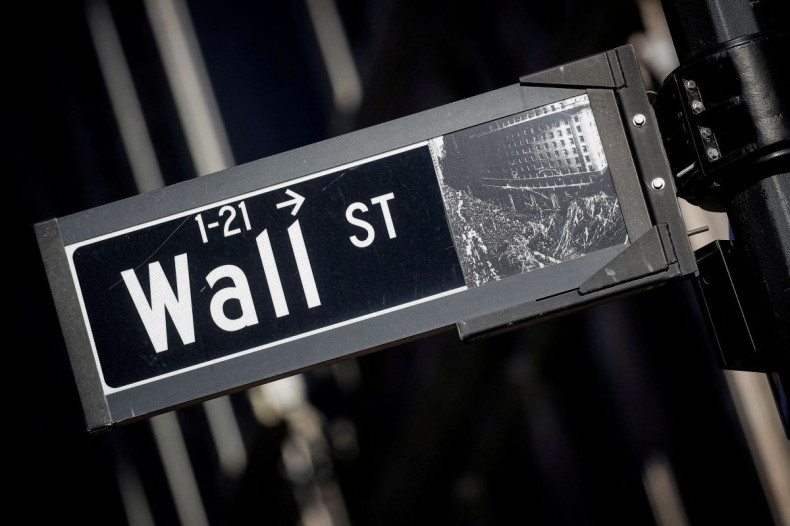 A street sign for Wall Street is seen in the financial district in New York, U.S., November 8, 2021.  