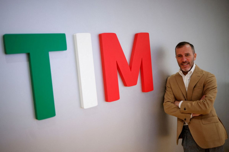 Telecom Italia's Pietro Labriola poses for a portrait next to the company's name at TIM headquarters in Rome, Italy, January 17, 2022.