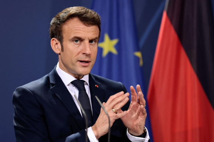 French President Emmanuel Macron speaks to the media ahead of a Weimar Triangle meeting to discuss the ongoing Ukraine crisis, in Berlin, Germany, February 8, 2022.