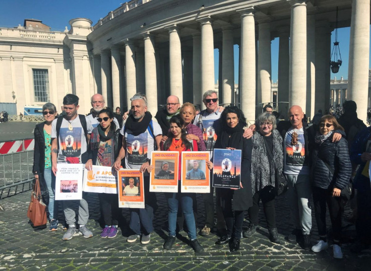 Victims of abuse by Roman Catholic priests at a school for the deaf in Argentina, their advocates and lawyers, pose to demand that the Vatican order Argentine Catholic Church officials to hand over documents concerning the school before another trail late