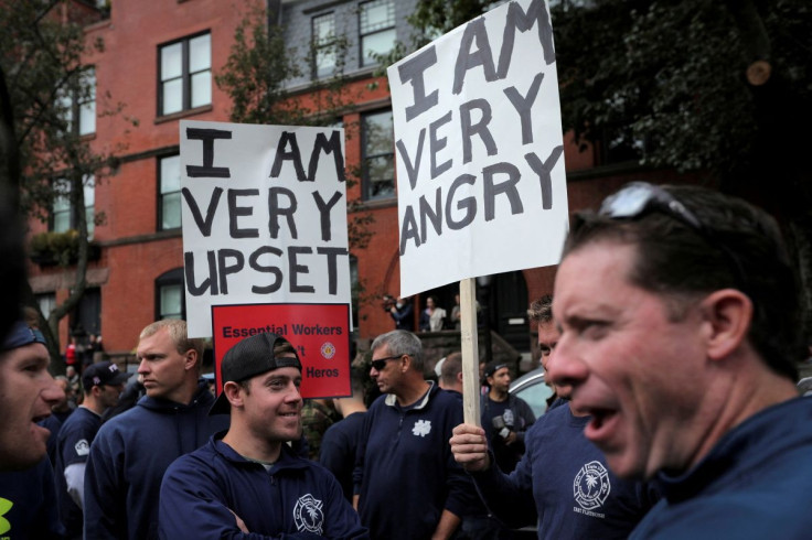 New York City Fire Department (FDNY) union members, municipal workers and others demonstrate during a protest against the city's COVID-19 vaccine mandates on Manhattan's Upper East Side in New York City, New York, U.S., October 28, 2021.