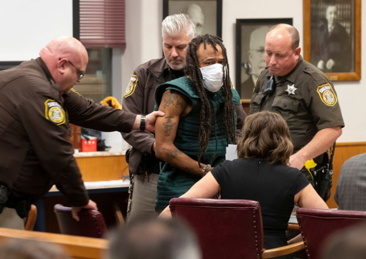 Darrell Brooks, charged with killing five people and injuring nearly 50 after plowing through a Christmas parade with his sport utility vehicle on November 21, appears in Waukesha County Court in Waukesha, Wisconsin, U.S. November 23, 2021. Mark Hoffman/