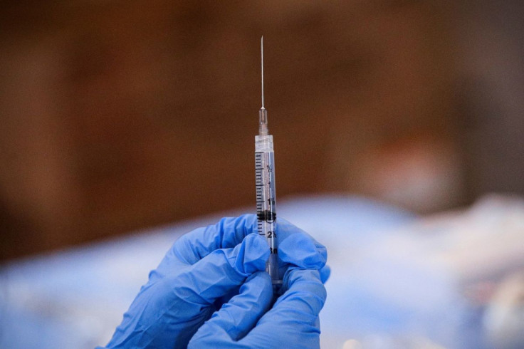 A syringe is filled with a dose of Pfizer's coronavirus disease (COVID-19) vaccine at a pop-up community vaccination center at the Gateway World Christian Center in Valley Stream, New York, U.S., February 23, 2021.  