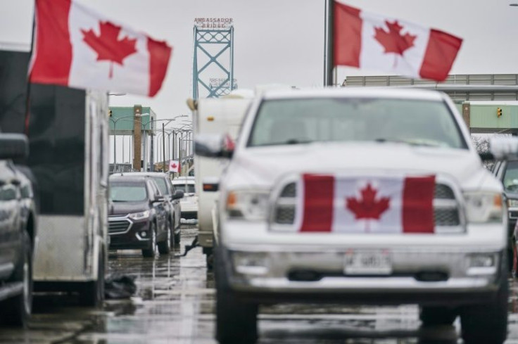 Protesters block the roadway at the Ambassador Bridge border crossing in Windsor, Ontario, Canada on February 11, 2022