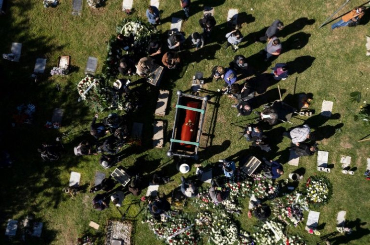 Mourners attend the burial of murdered journalist Lourdes Maldonado in Mexico's northwestern border city of Tijuana