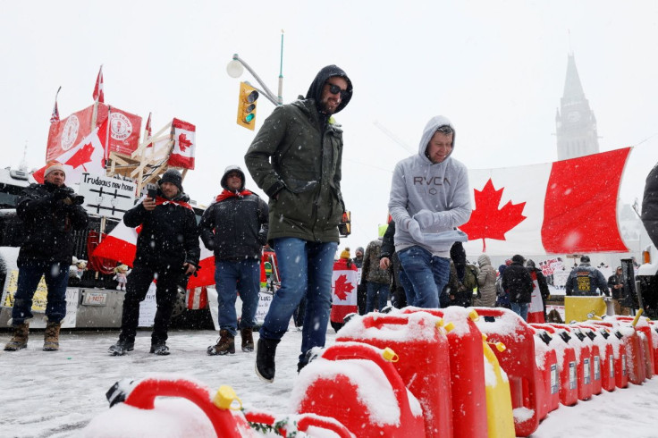 Demonstrators gather downtown as truckers and supporters continue to protest coronavirus disease (COVID-19) vaccine mandates, in Ottawa, Ontario, Canada, February 12, 2022. 