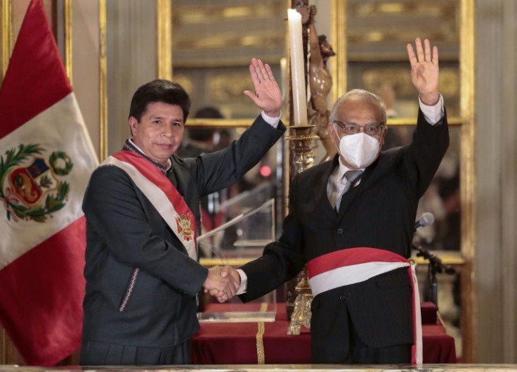 Wearing his presidential sash, Pedro Castillo (left) was seen in public without his signature hat for the first time when swearing in his fourth cabinet since taking office