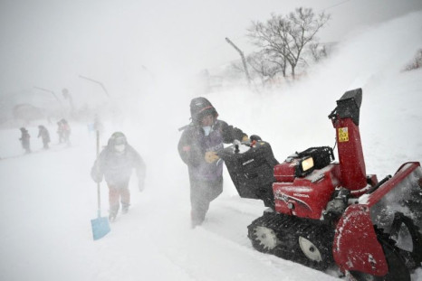 Heavy snow fell on the Beijing Games on Sunday