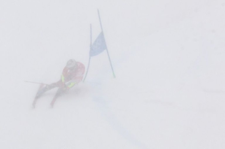 Switzerland's Marco Odermatt competes in the first run of the men's giant slalom despite the poor visibility