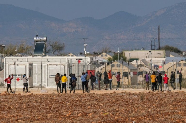 Migrants at the Pournara centre, in Kokkinotrimithia, some 20 kilometres from Cyprus' capital Nicosia, on November 22, 2021