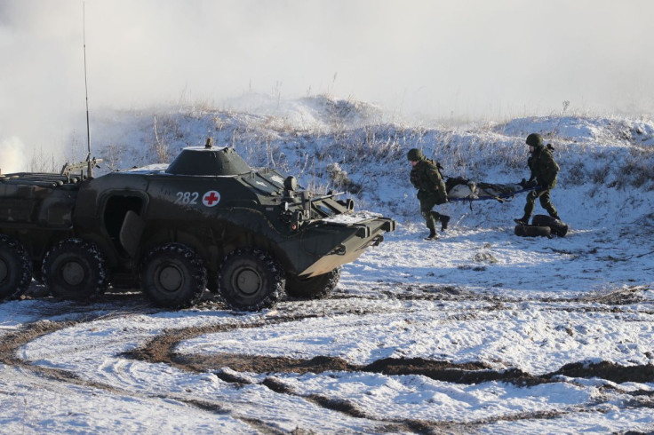 Service members take part in military exercises held by the armed forces of Russia and Belarus at the Gozhsky training ground in the Grodno region, Belarus, February 12, 2022. Leonid Scheglov/BelTA/Handout via REUTERS