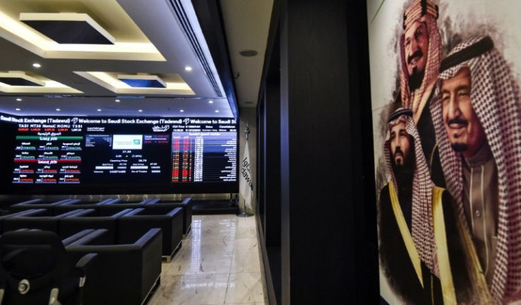 A board displays share prices at the Saudi Stock Exchange