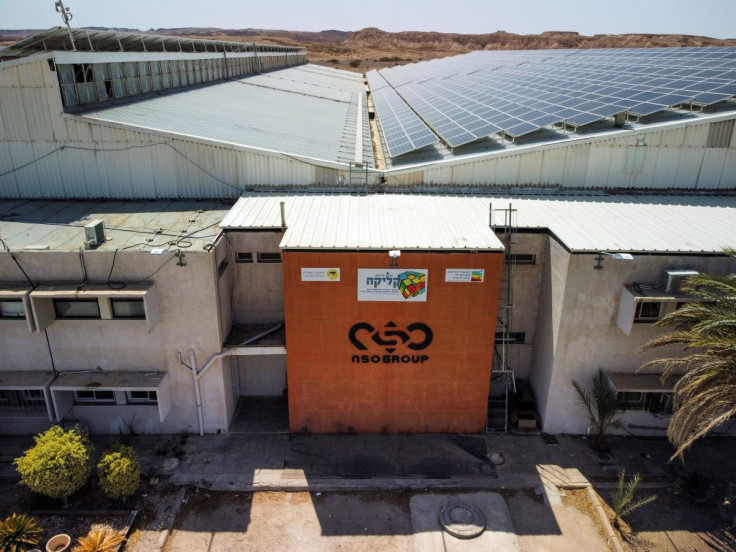 An aerial view shows the logo of Israeli cyber firm NSO Group at one of its branches in the Arava Desert, southern Israel July 22, 2021. Picture taken with a drone. 