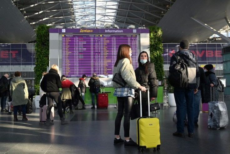 The mood at Kyiv's main airport was relaxed despite calls from a growing number of Western countries for their citizens to leave