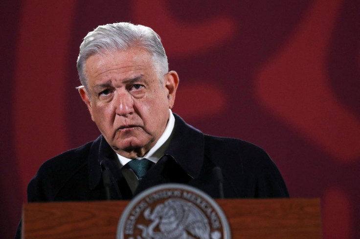 Mexico's President Andres Manuel Lopez Obrador looks on during a news conference at the National Palace in Mexico City, Mexico, February 10, 2022. 