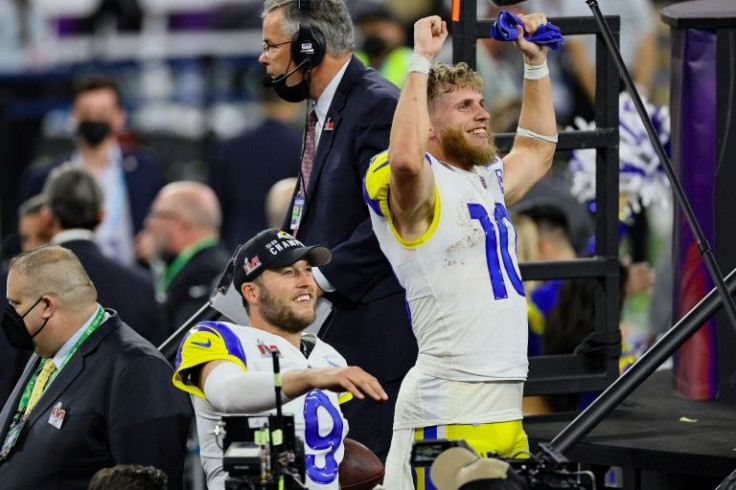 Cooper Kupp, right, and Matthew Stafford of the Los Angeles Rams celebrate after their team won Super Bowl 56 on Sunday